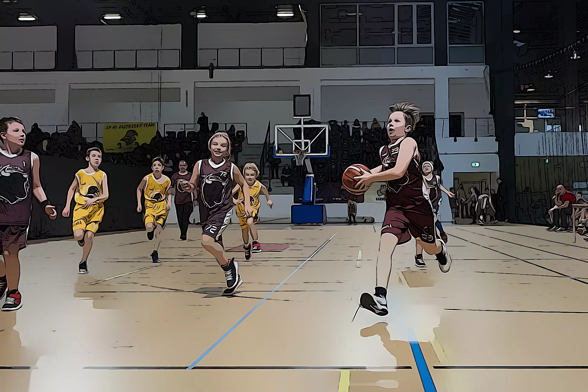 Dzieci grające w koszykówkę podczas rozgrywek Mini Basket Liga