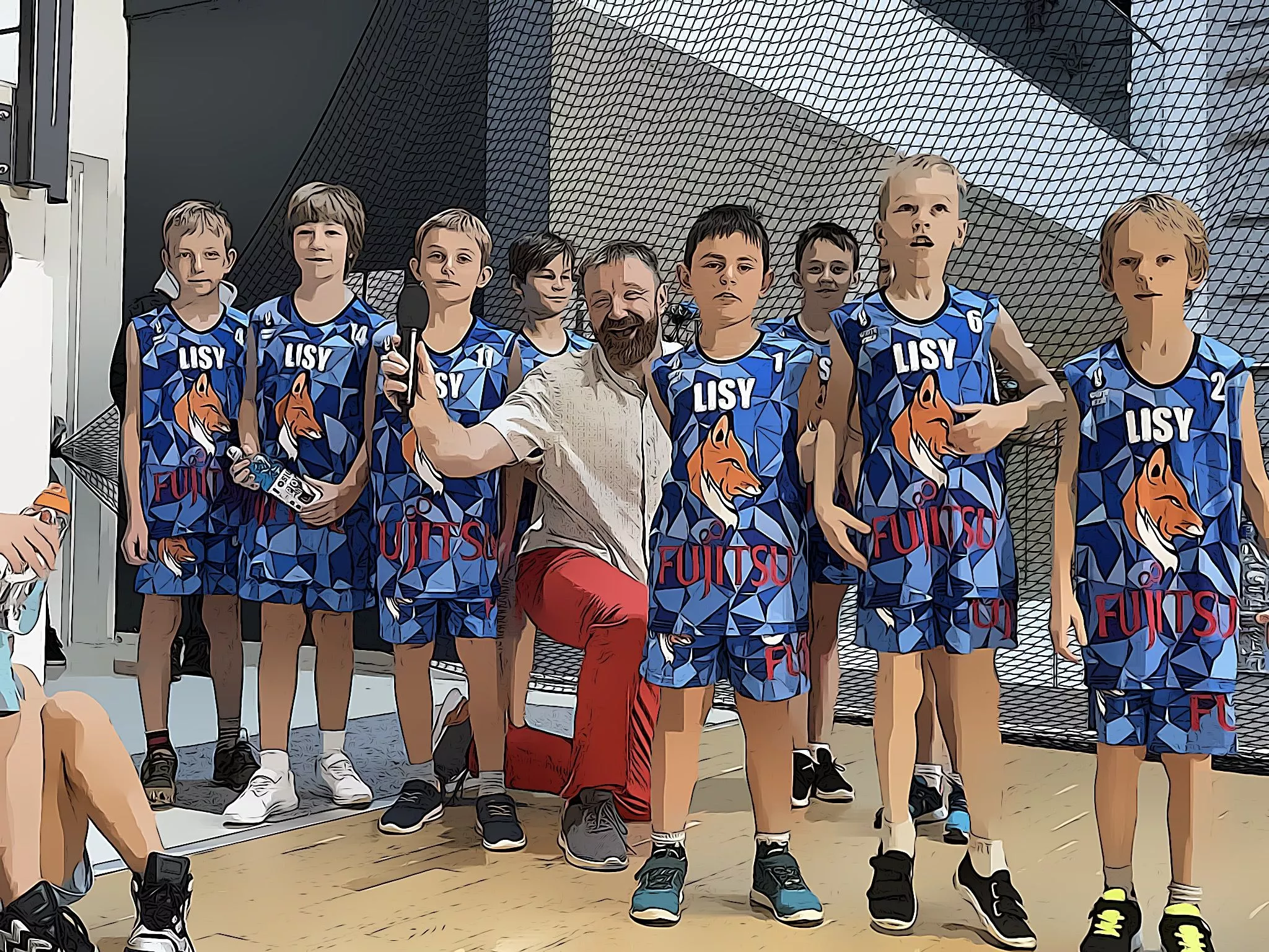 Uczniowie szkoły podstawowej podczas treningu koszykówki